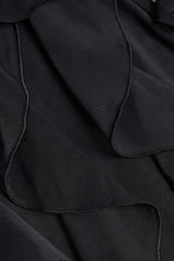 Ruffled Mid-Rise Flared Trousers in Black