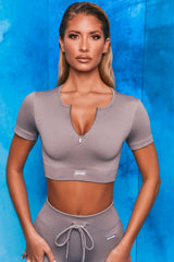 Perform Ribbed Short Sleeve Zip Front Crop Top in Dark Grey