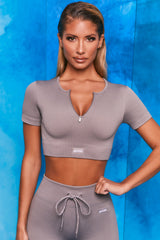 Perform Ribbed Short Sleeve Zip Front Crop Top in Dark Grey