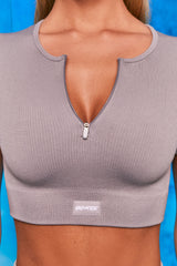 Perform Ribbed Short Sleeve Zip Front Crop Top in Dark Grey