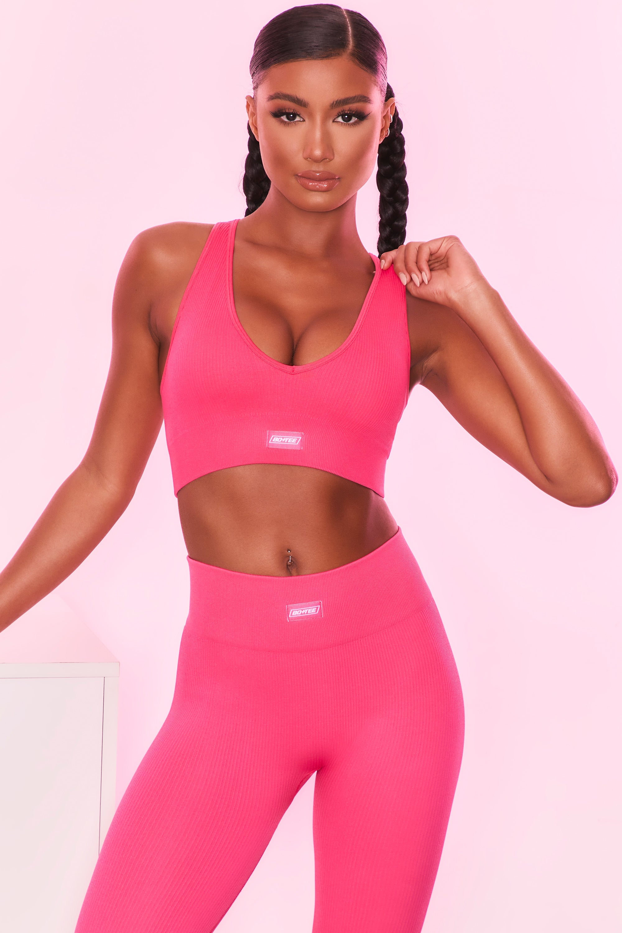Ribbed Plunge Neck Sports Bra in Hot Pink