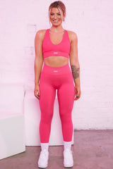 Ribbed Plunge Neck Sports Bra in Hot Pink