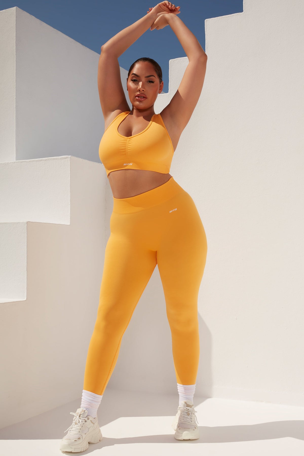 Surge Petite Curved Waist Seamless Leggings in Light Orange