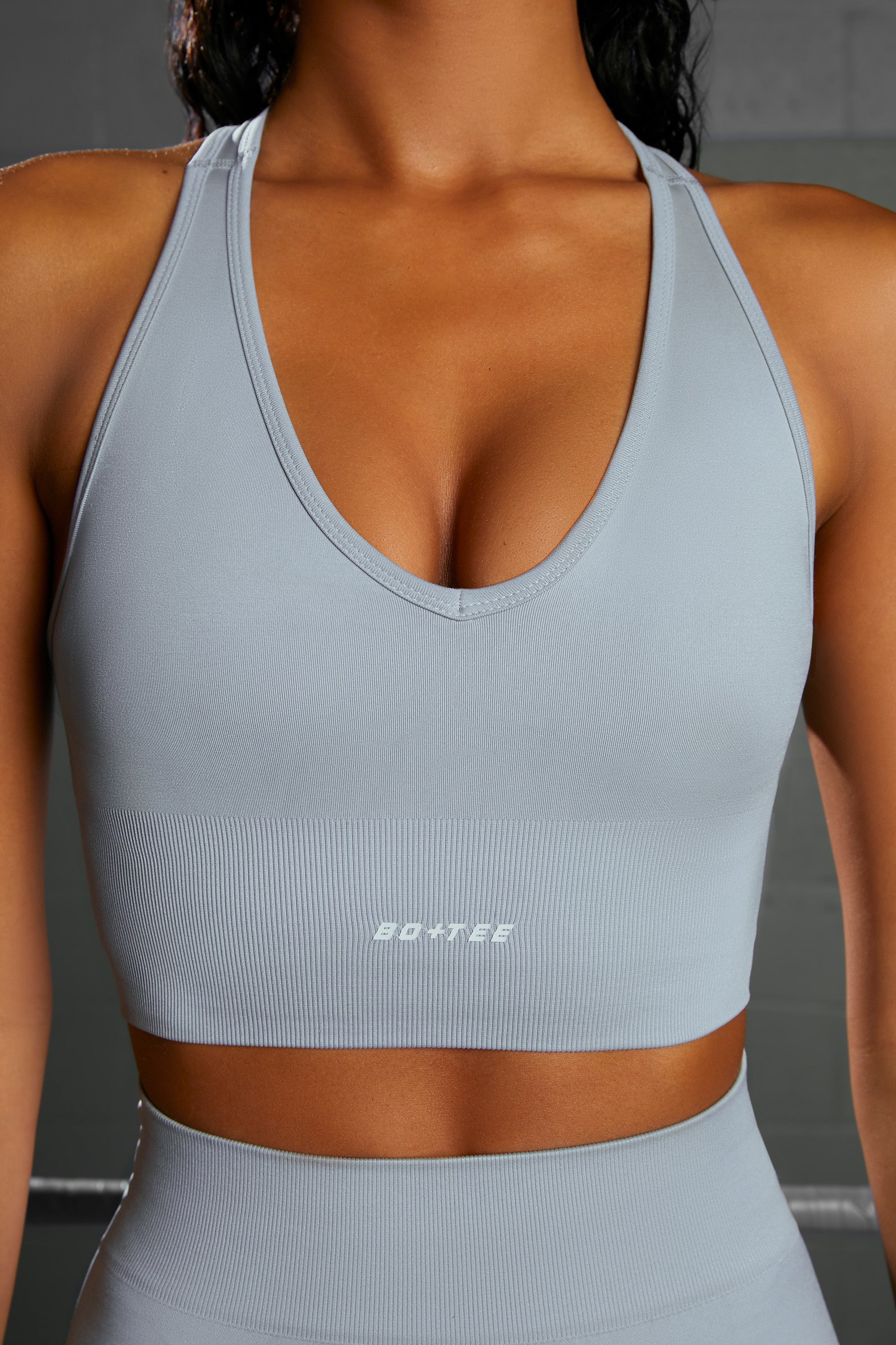 Overhaul Racer Knot Back Seamless Crop Top in Blue