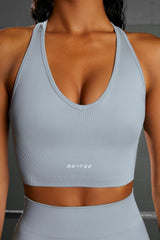 Overhaul Racer Knot Back Seamless Crop Top in Blue