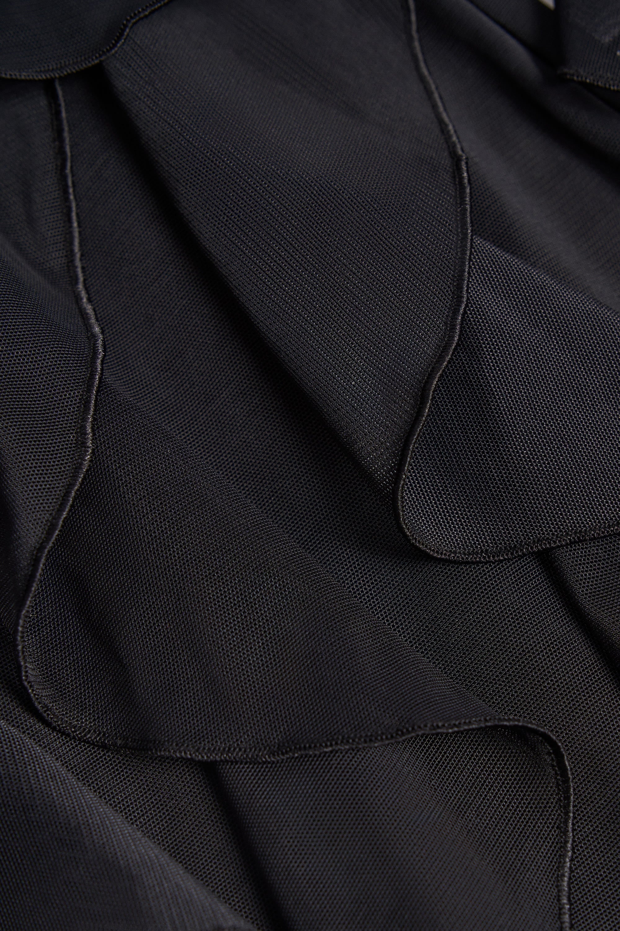 Ruffled Mid-Rise Flared Trousers in Black